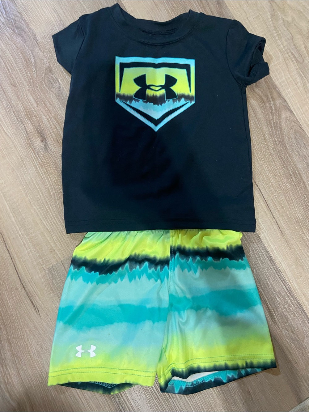 Under Armour Black Rashguard Top with Teal and Yellow Gradient Shorts